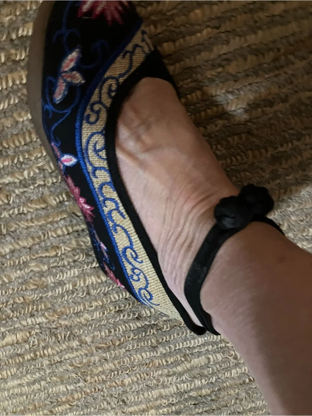 Black Embroidered Wedge Slip-On with Colorful Floral Accent!